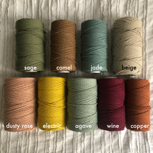 Load image into Gallery viewer, A collection of different colored spools of cotton string. Sage, camel, jade, beige, dusty rose, electric, agave, wine, copper.
